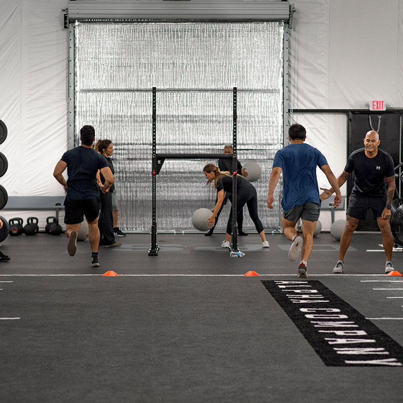 students participating in a training circuit indoors